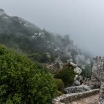The historic castle of the Moors in Sintra, Portugal on a foggy day